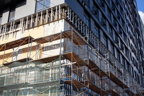 Extensive scaffolding providing platforms for work in progress on a new apa.. Stock Photos
