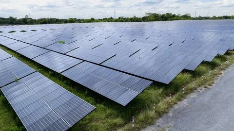 Extensive Solar Panel Array Harvesting Renewable Energy In Rural Thailand L.. Stock Photos