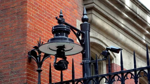 Exterior Close-Up of Security Cameras at Royal Courts of Justice, London Stock Footage 286135980