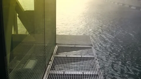 Exterior Elevator Maintenance Grating Over Harbor Water Stock Footage 19129235