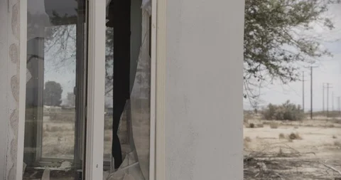 Exterior Home Window with Brick Breaking Glass Stock Footage 89942028