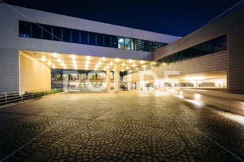 The exterior of the Hong Kong Cultural Centre at night, in Kowloon, Hong Kong Stock Photos