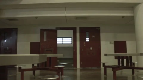 Exterior of Jail Cell with Guard Stock Footage 64000807