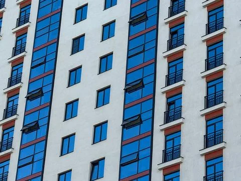 Exterior of a modern multi-storey apartment building. Stock Photos