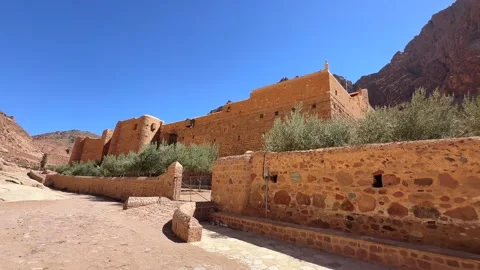Exterior monastery building with mountain background Stock Footage 341452425