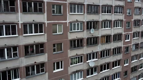 The exterior of a multi-storey apartment building with dirty balconies Stock Footage 328649592
