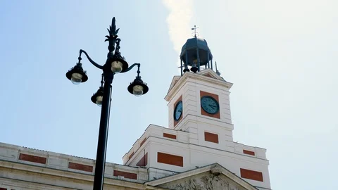 Exterior of an old clock tower with bells against blue sky in Madrid. Spain. 4K 库存影片 128032696