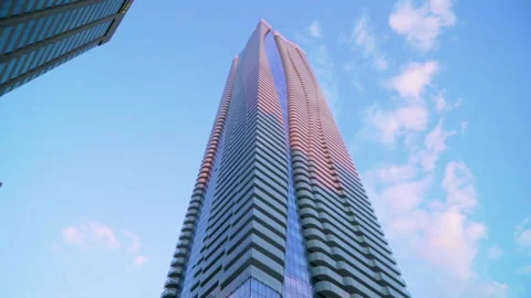 Exterior of the One Bloor multifamily condo complex at sunset in Stock Footage