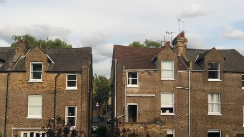 Exterior rear view of middle class homes in Tufnell Park, London, England. Video stock 200134302