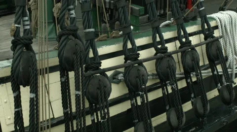 Exterior side deck of a sailing ship with draped ropes  Stock Footage 61281184