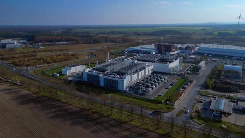Exterior view bIg Data center building, global cloud computing. Smooth aerial Stock Footage 321735778