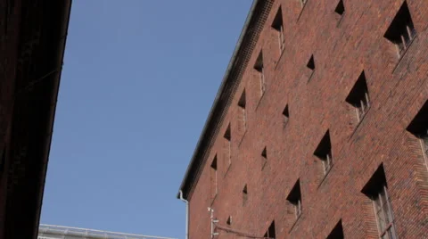 Exterior view of the facade of a red brick building Stock Footage 59831841