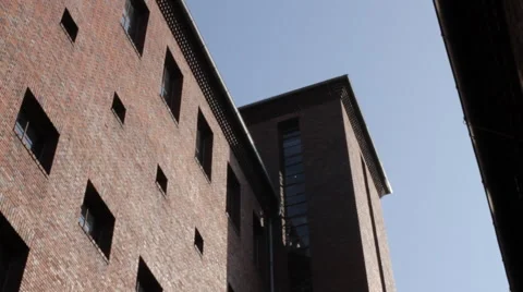 Exterior view of the facade of a red brick building Stock Footage 59832666