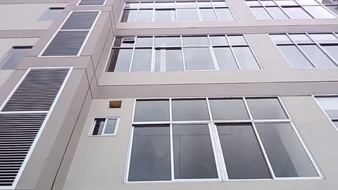 Exterior view of modern architecture building facade during daylight hours Stock Footage 343933482