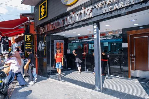 Exterior view of Turkish exchange office and some people change deposit cash Stock Photos