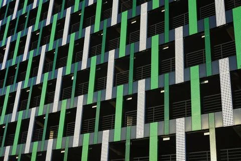 Exterior wall of multi-level overground parking, beautiful green facade Stock Photos