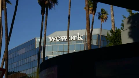 Exterior of WeWork building that provides shared workspaces for startups. Видео 149016208