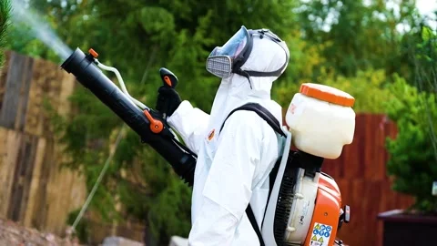 Exterminator processing a tree Stock Footage 147499657