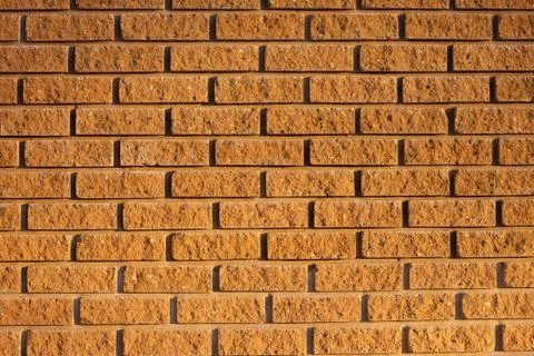 External brown brick wall background Stock Photos