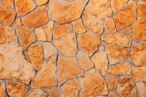 External brown stone wall background Foto stock