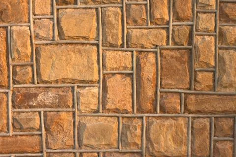 External brown stone wall background Stock Photos