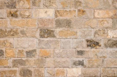 External brown stone wall background Stock Photos