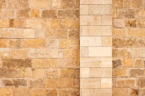 External brown stone wall background Stock Photos