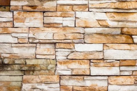 External brown stone wall background Stock Photos