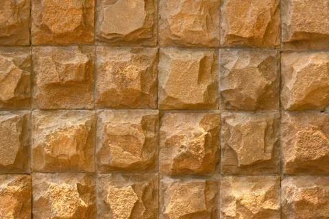External brown stone wall background Stock Photos