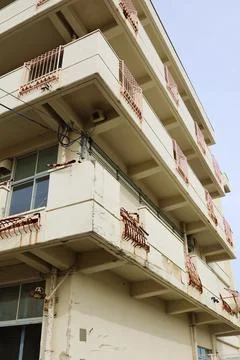 External damage to the school building due to the tsunami. Stock Photos
