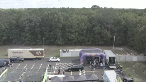External Drone Shot over High School Parking Lot Stock Footage 162872501