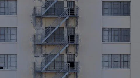 External fire escape on the side of an industrial building in Los Angeles Stock Photos