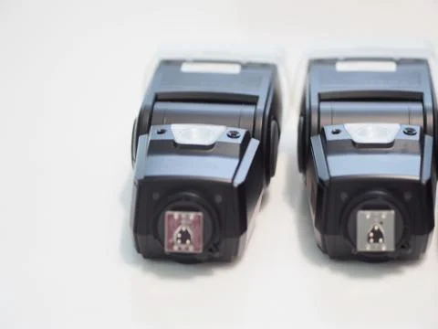 External flashes for camera on white background. Foto stock