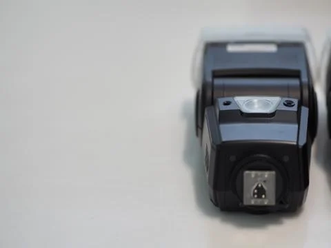 External flashes for camera on white background. Stock Photos