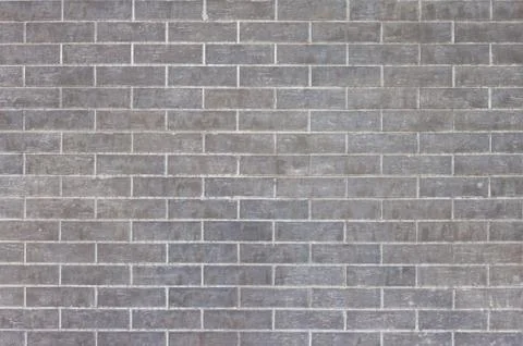 External grey brick wall background Stock Photos