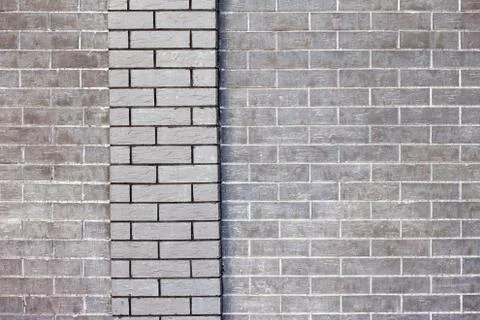 External grey brick wall background Stock Photos