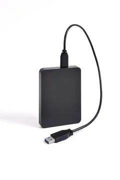 External Hard Disk drive with usb cable isolated on white background Foto stock