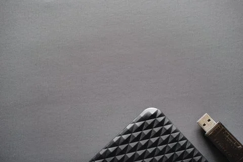 External Hard Drive and USB Flash Drive on Gray Background (Top View) Stock Photos
