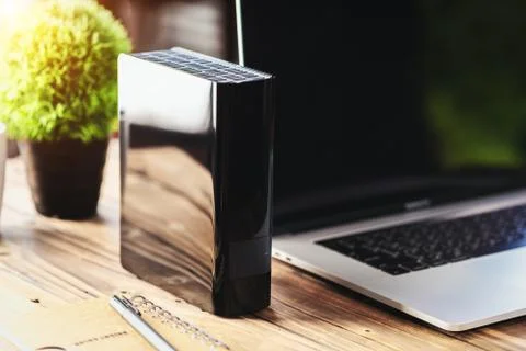 External hard drive on desk Stock Photos