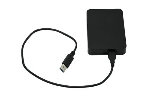 External hard drive for storing and transferring various files on a white bac Stock Photos