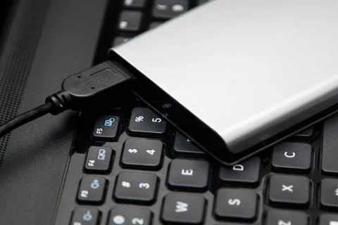 External HDD and laptop Stock Photos