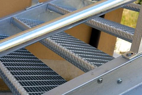 An external metal fire escape made of galvanized steel. 库存照片