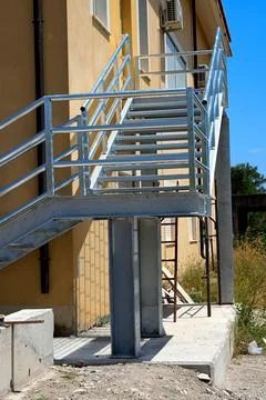 An external metal fire escape made of galvanized steel. 스톡 사진