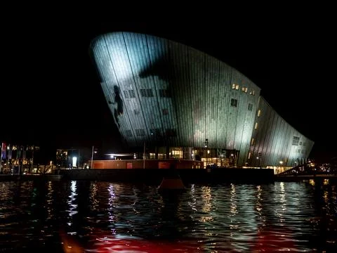 External night view of the NEMO Science Museum in sight Stock Photos