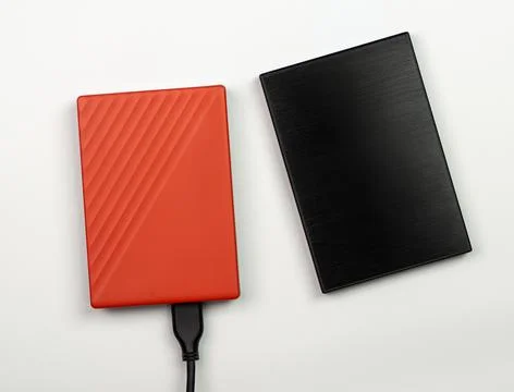 External portable Data storage HDD device for computer with copyspace. Stock Photos
