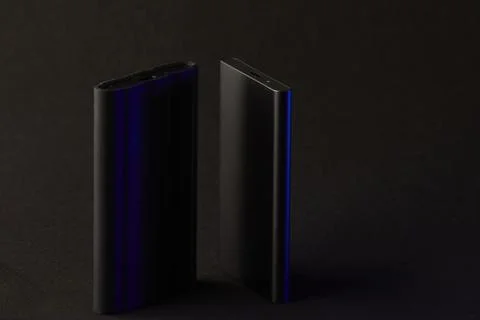 External SSD drives illuminated by subtle light modern tech minimalism Stock-Fotos
