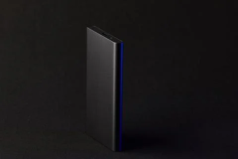 External SSD solid state drive on dark background modern technology Stock Photos