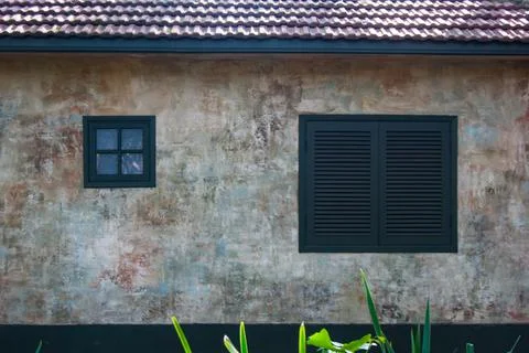 External view of an ancient vintage window of a medieval town in Italy, Europe. Stock Photos