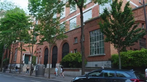 External view of Montmarte Aux Artises red brick apartments facade Stock Footage 308207863