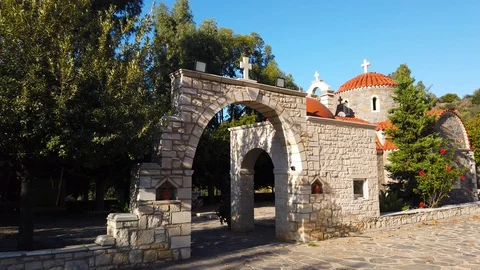 External view, wall of a small greek church against a blue sky. Countryside.  Stock-Footage 127968724